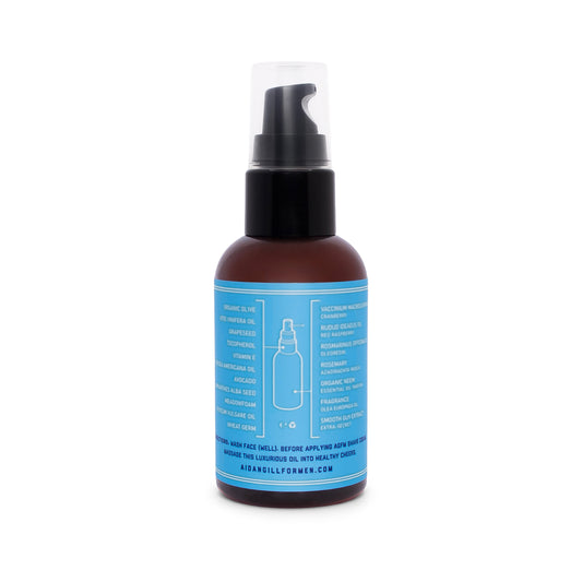 Back of shave oil bottle with blue label on a white background